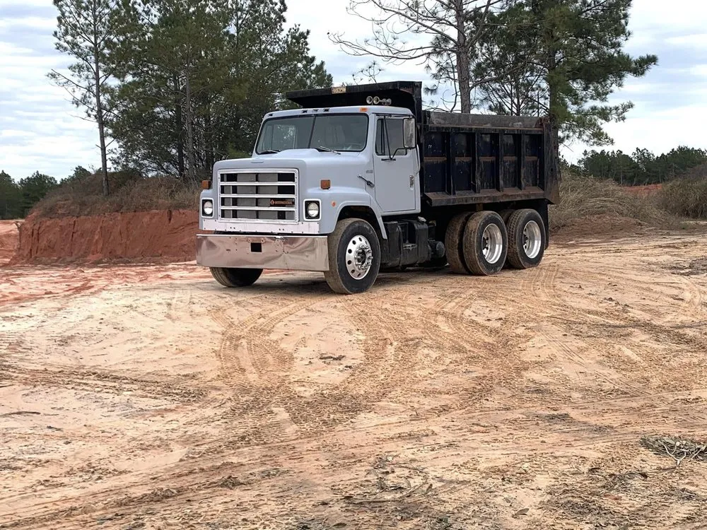 Professional lawn mowing service experts serving Saucier, MS - Necaise Hauling And Tractor Work