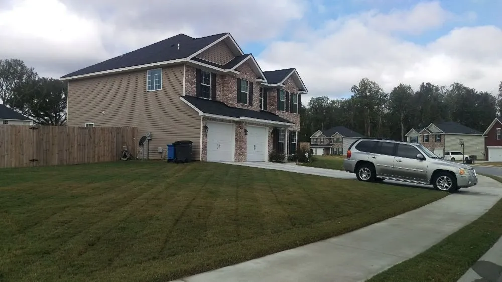 Expert lawn mowing service for residential properties across Hinesville, GA - Neighborhood Lawn Care & Maintenance