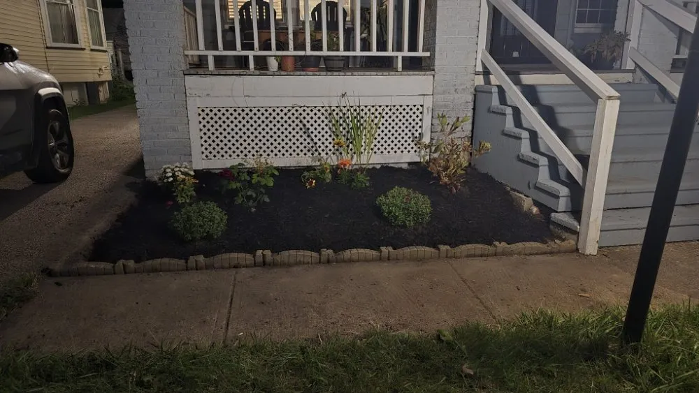 Trusted lawn care service with custom design in Lakewood, OH by Neighborhood Nurturer