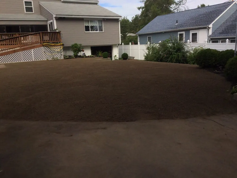 Expert lawn mowing service in Randolph, MA by Nelson Landscaping & Garden Center