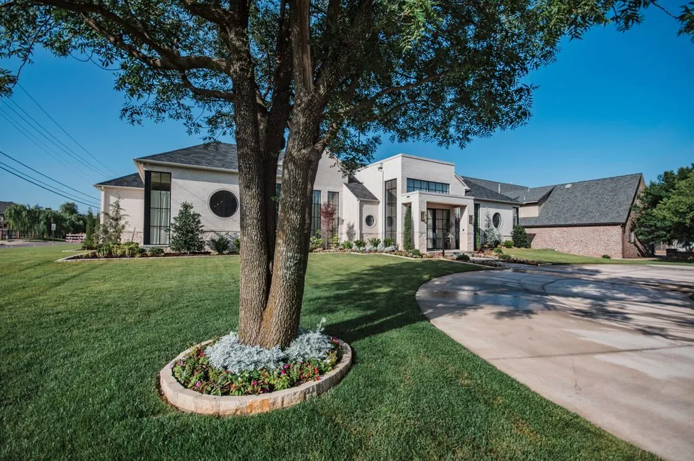 Custom landscaping services for year-round maintenance in Oklahoma City, OK by Nelson Landscaping