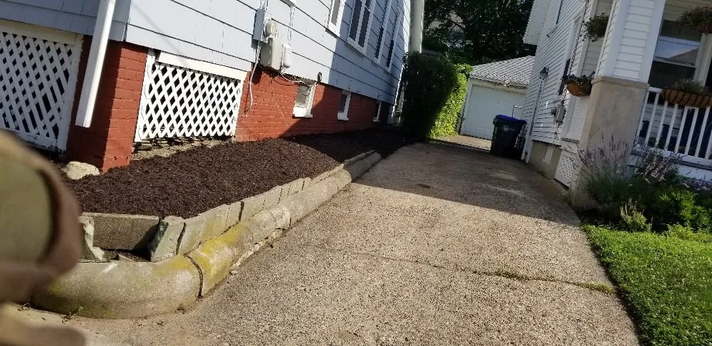 Local lawn care service for residential properties in Providence, RI by Nelson Landscaping