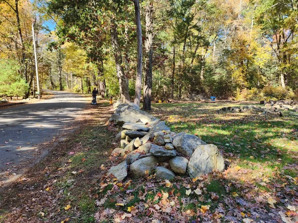 Professional lawn mowing service for year-round maintenance in Franklin, MA by Net Zero Landscaping