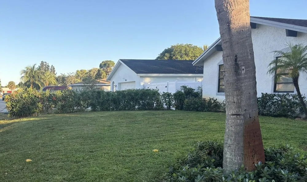 Professional landscape installation in Riviera Beach, FL by Neuma R Lawn Maintenance