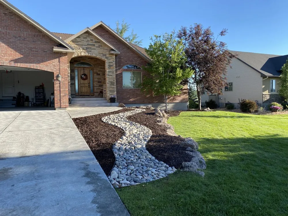 Custom outdoor landscaping for year-round maintenance across Rigby, ID - Never Ending Landscape