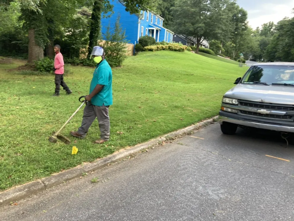 Expert lawn mowing service for homes across Atlanta, GA - New Beginning Landscape & Remodel