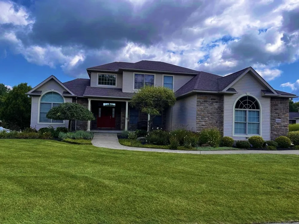 Custom landscape installation for residential properties in Cuyahoga Falls, OH by New Beginnings Lawn And Landscape Services