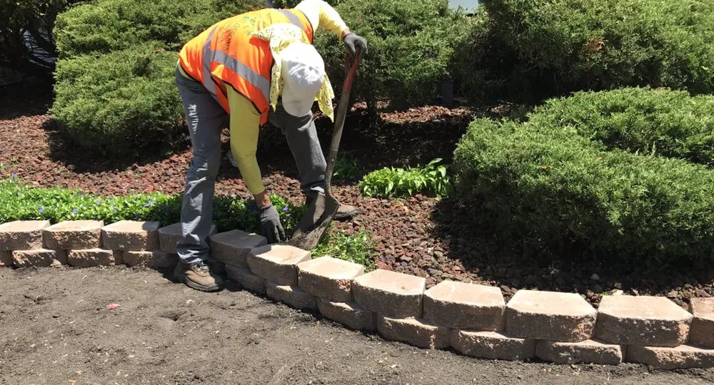 Expert landscape installation with custom design across Chicago, IL - New Blossoms Lawn Care