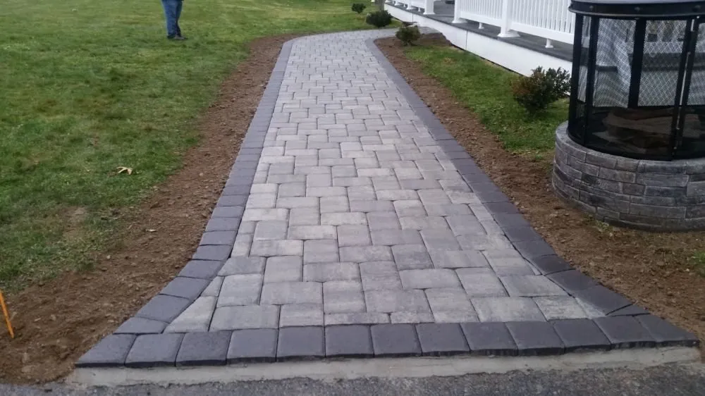 Custom landscape design for year-round maintenance in Providence, RI by New Dawn Landscaping and construction