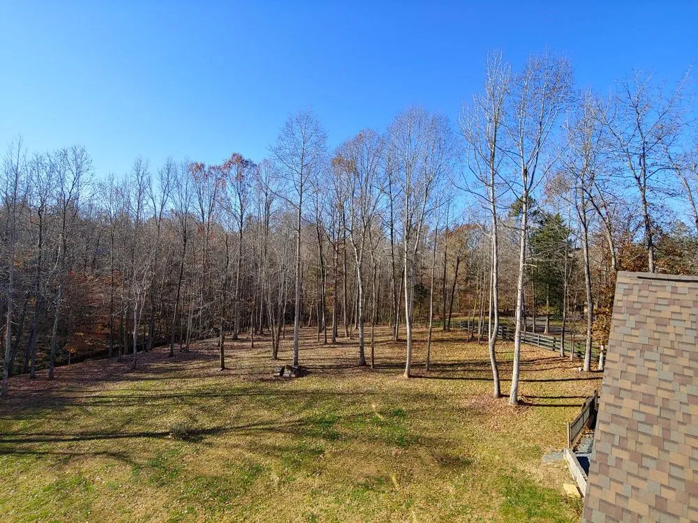 Professional lawn mowing service for outdoor upgrades in Mebane, NC by New Day Landscape & Hardscaping of Mebane