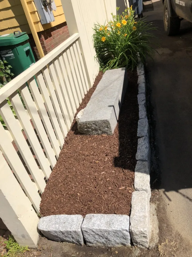 Affordable lawn mowing service for year-round maintenance in West Everett, MA by New Day Landscaping