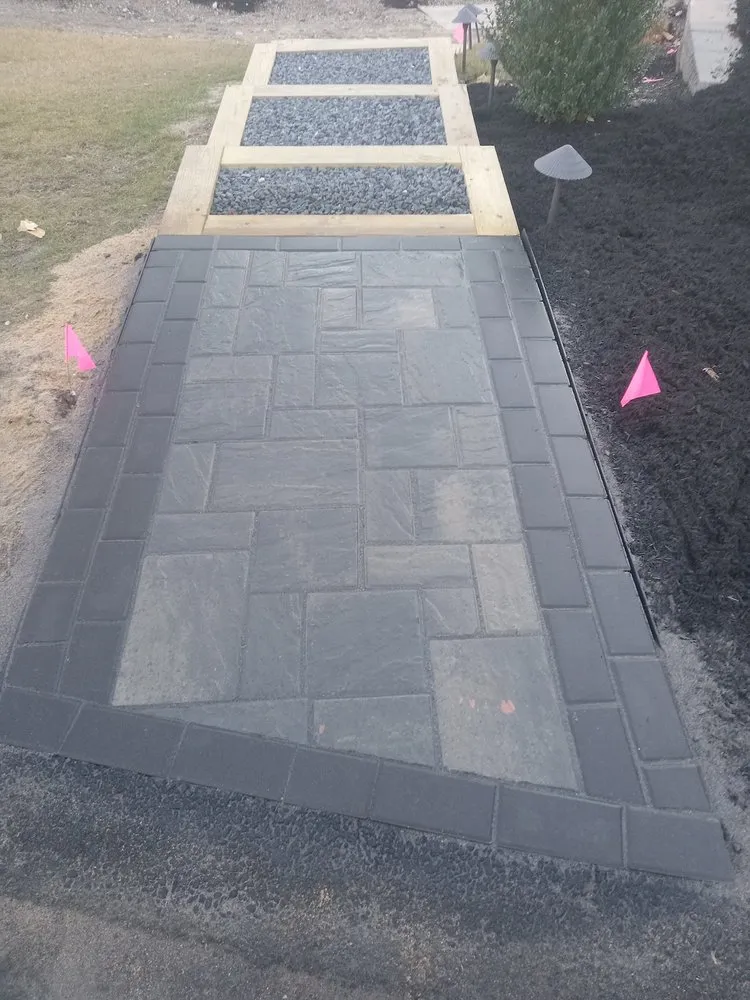 Affordable lawn mowing service with custom design across Forestdale, MA - New Driveway Solutions