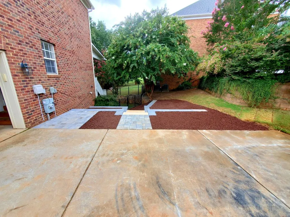 Affordable lawn care service for year-round maintenance in Indian Trail, NC by New England Hardscapes & Landscapes