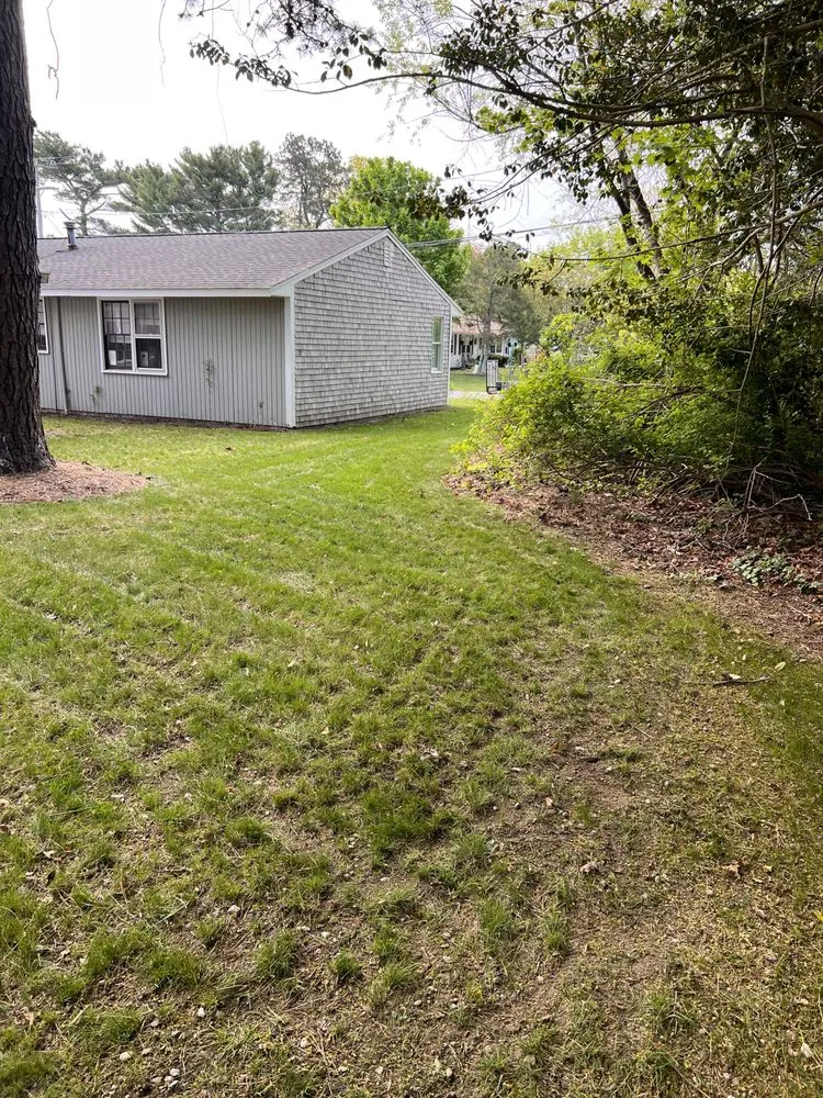 Professional yard maintenance for year-round maintenance in Wareham, MA by New England Landscape and Design