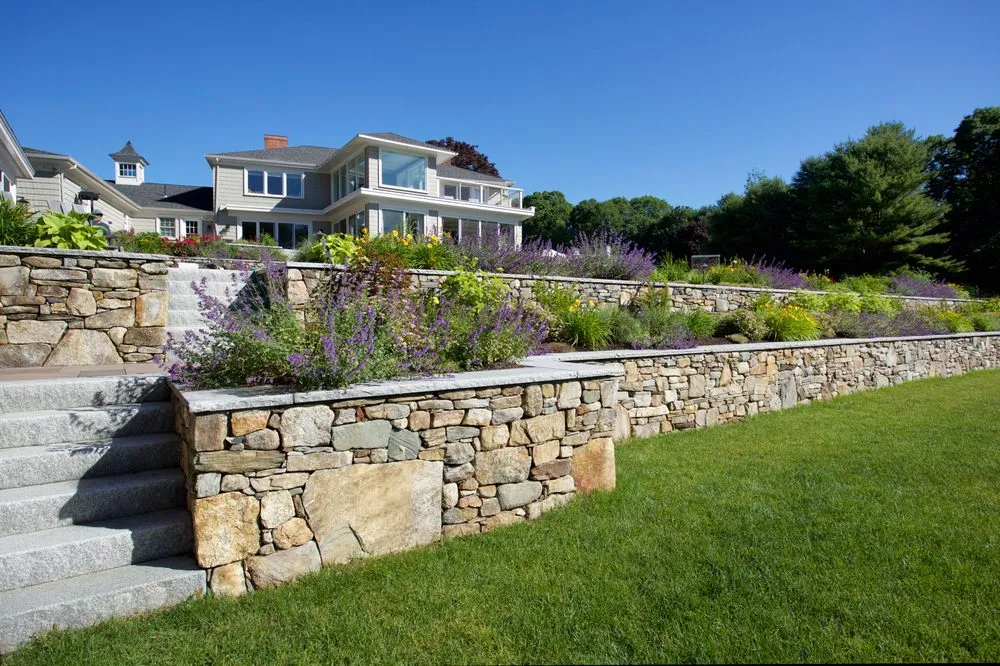 Expert outdoor landscaping for residential properties in Falmouth, ME by New England Landscapes