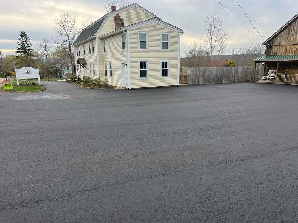 Local garden landscaping with custom design in Spencer, MA by New England Landscaping