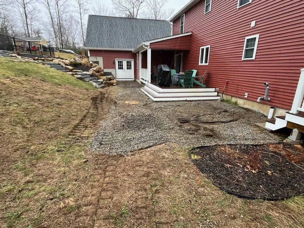 Professional landscape installation for year-round maintenance in Spencer, MA by New England Landscaping