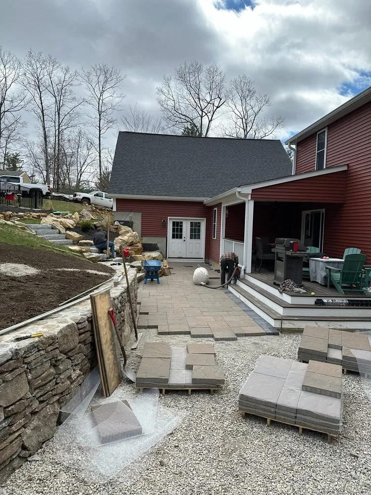 Custom yard cleanup service for outdoor upgrades across Spencer, MA - New England Landscaping