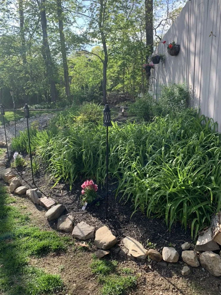 Reliable lawn mowing service in Colchester, CT by New England Lawn Care & Construction