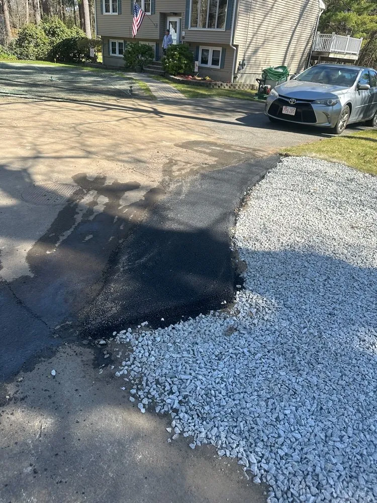 Affordable lawn care service for homes in Chelmsford, MA by New England pave works