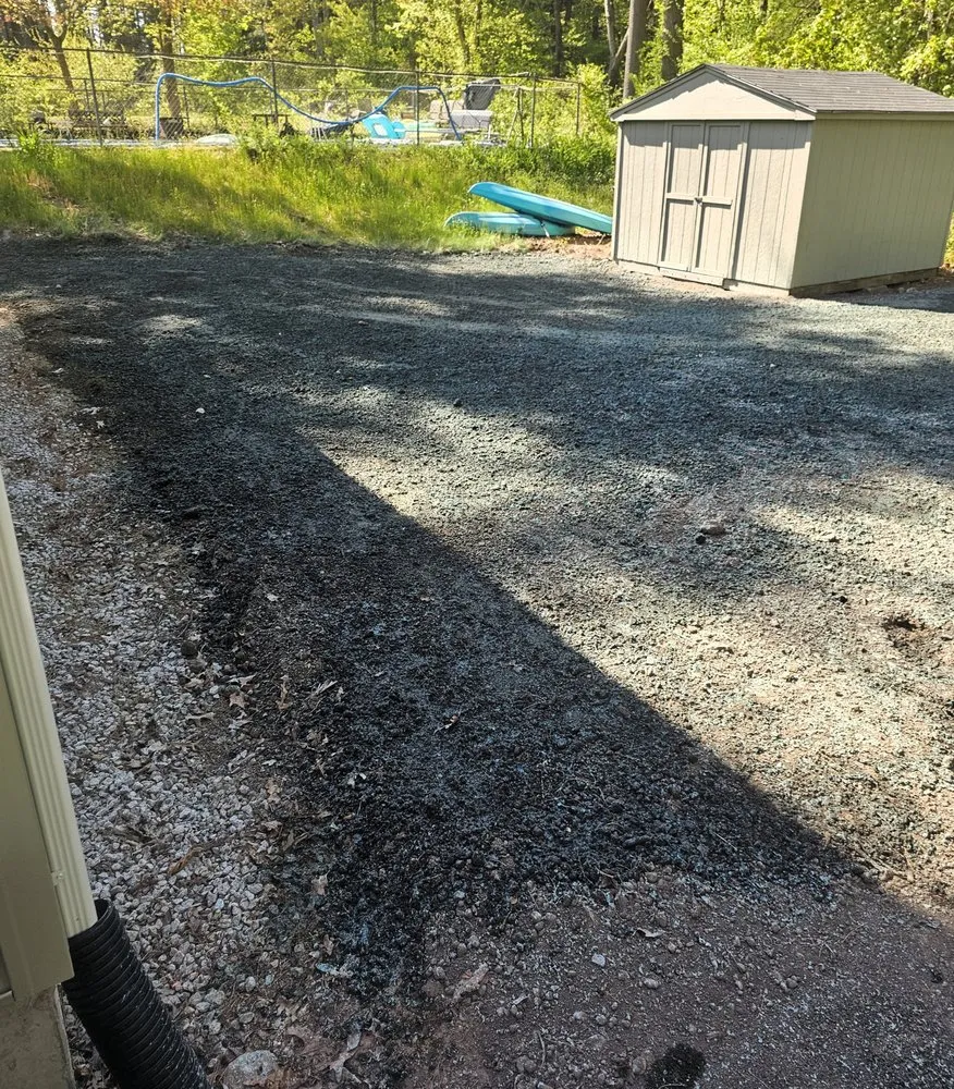 Custom lawn mowing service in Chelmsford, MA by New England pave works