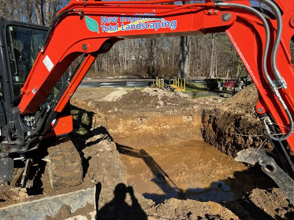 Expert lawn mowing service for year-round maintenance across Greenwich, CT - New England Total Landscaping