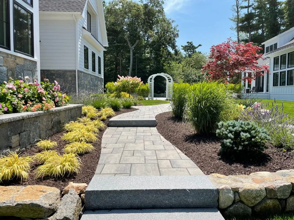 Custom landscape installation in Fairhaven, MA by New England Tree & Landscape