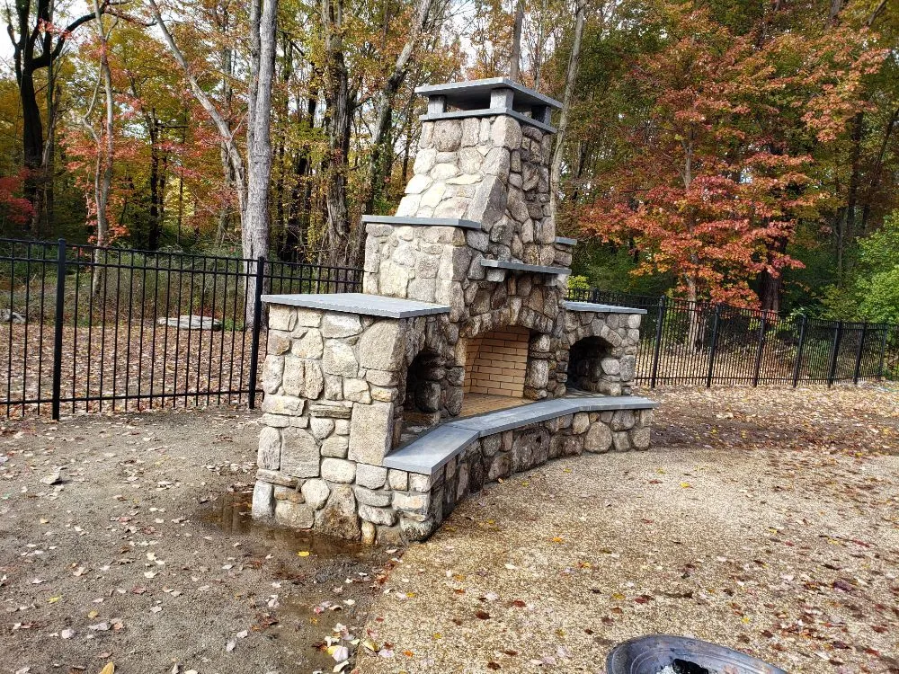 Expert yard cleanup service for year-round maintenance in Pawtucket, RI by New Era Masonry and Construction