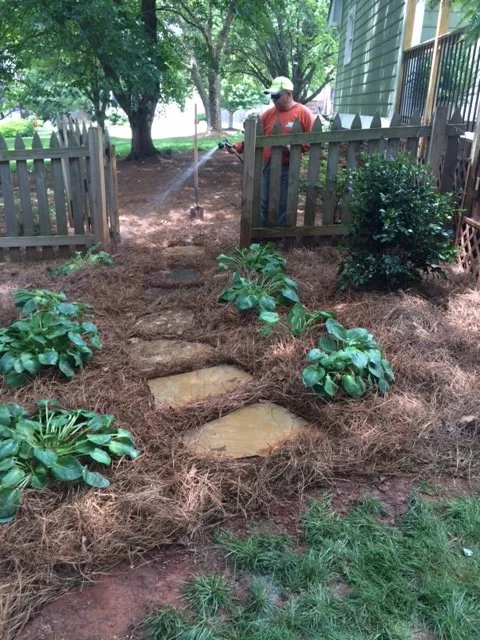 Professional yard maintenance for year-round maintenance in Greensboro, NC by New Garden Landscaping & Nursery