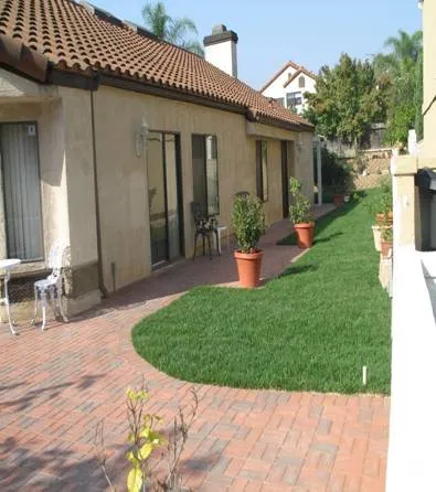 Affordable lawn care service for residential properties in Covina, CA by New Growth Landscaping