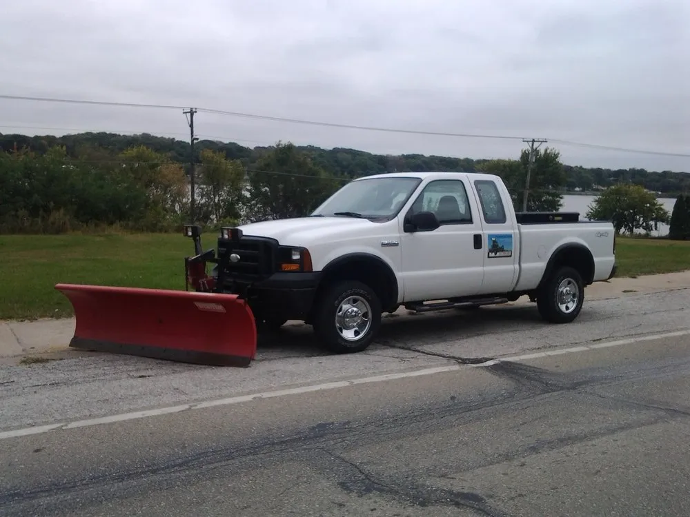 Professional lawn care service for year-round maintenance across Le Claire, IA - New Horizon Lawn Services