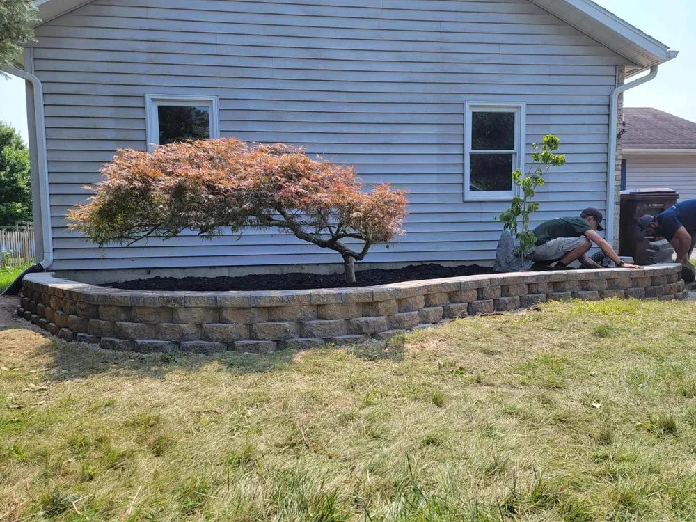Top-rated yard cleanup service with custom design in Marshall, MI by New Horizon Property Management