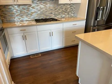 Professional lawn mowing service for year-round maintenance in Denver, CO by New Image Painting and Landscaping