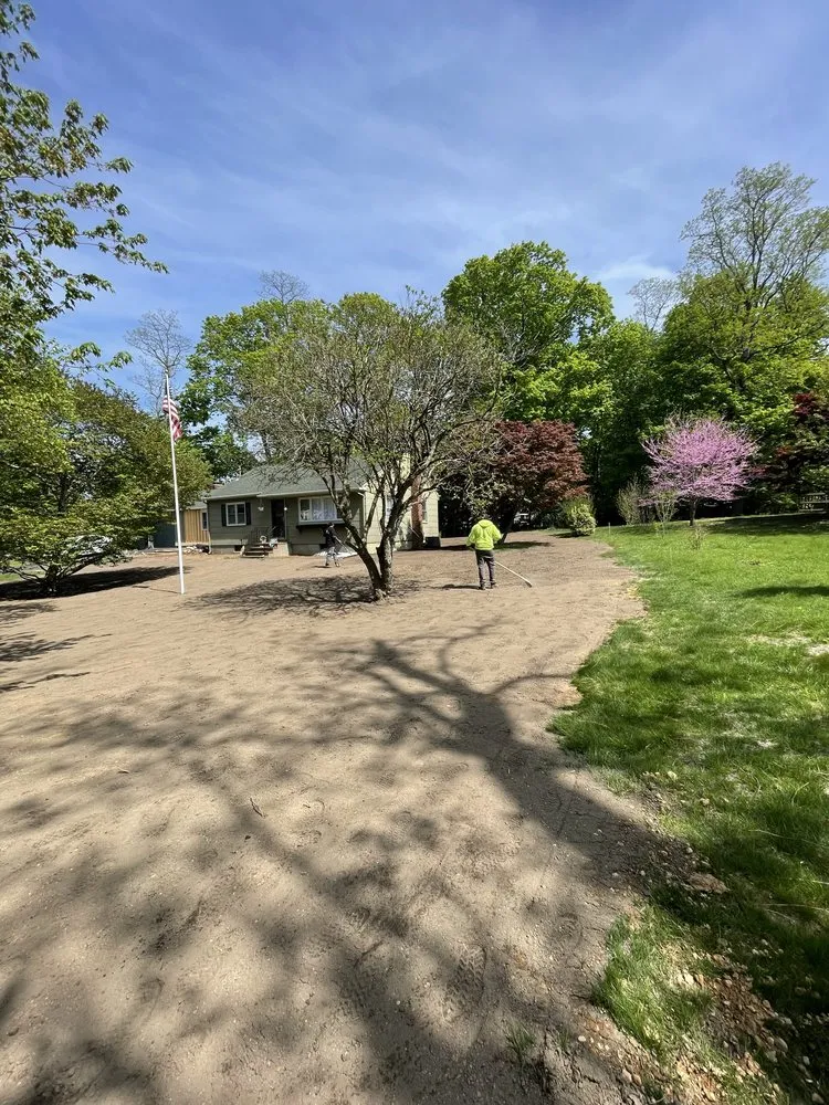 Local lawn mowing service for year-round maintenance in Brentwood, NY by New island services