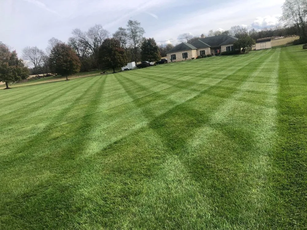 Reliable lawn mowing service for beautiful yards in Durham, NC by New Land Hardscape & Landscaping Services