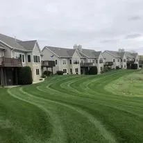 Professional landscape design with custom design in Suamico, WI by NEW Landscape & Lawn Care