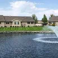 Custom landscape installation in Suamico, WI by NEW Landscape & Lawn Care