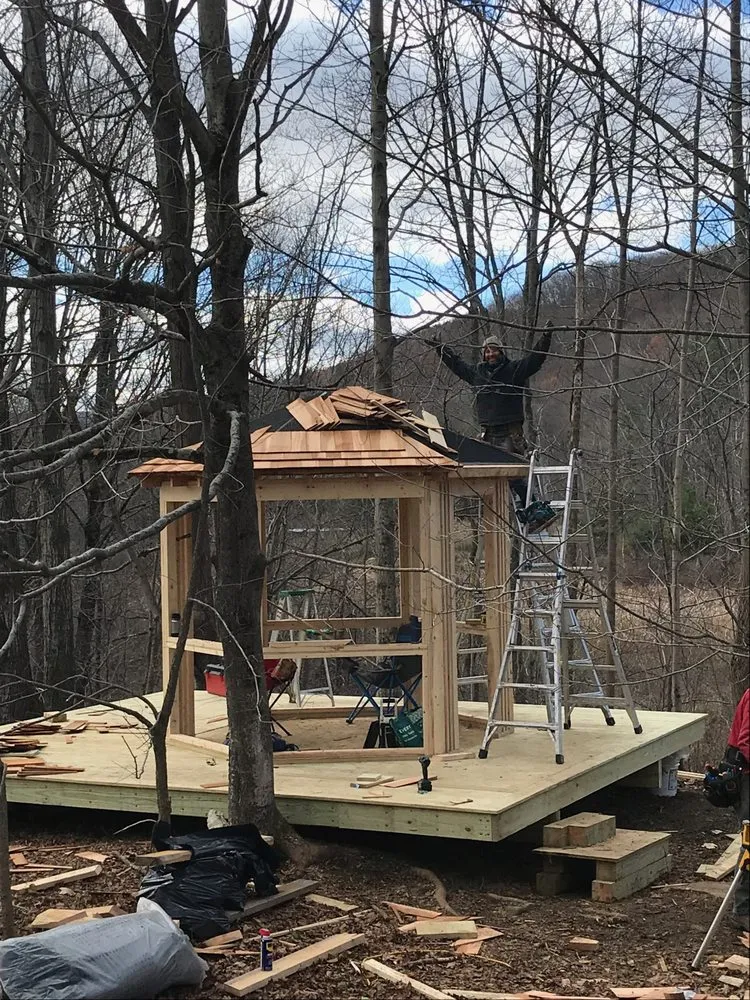 Professional lawn mowing service with custom design across Nassau, NY - New Leaf Building Company