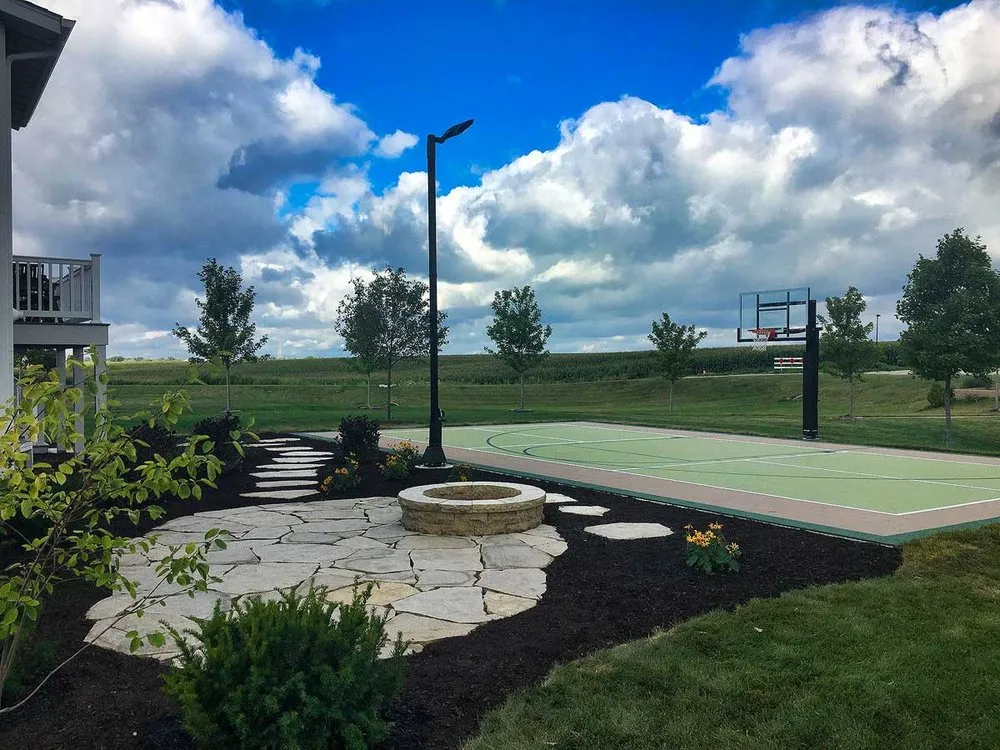 Expert yard cleanup service for residential properties in Davenport, IA by New Leaf Landscapes & Concrete