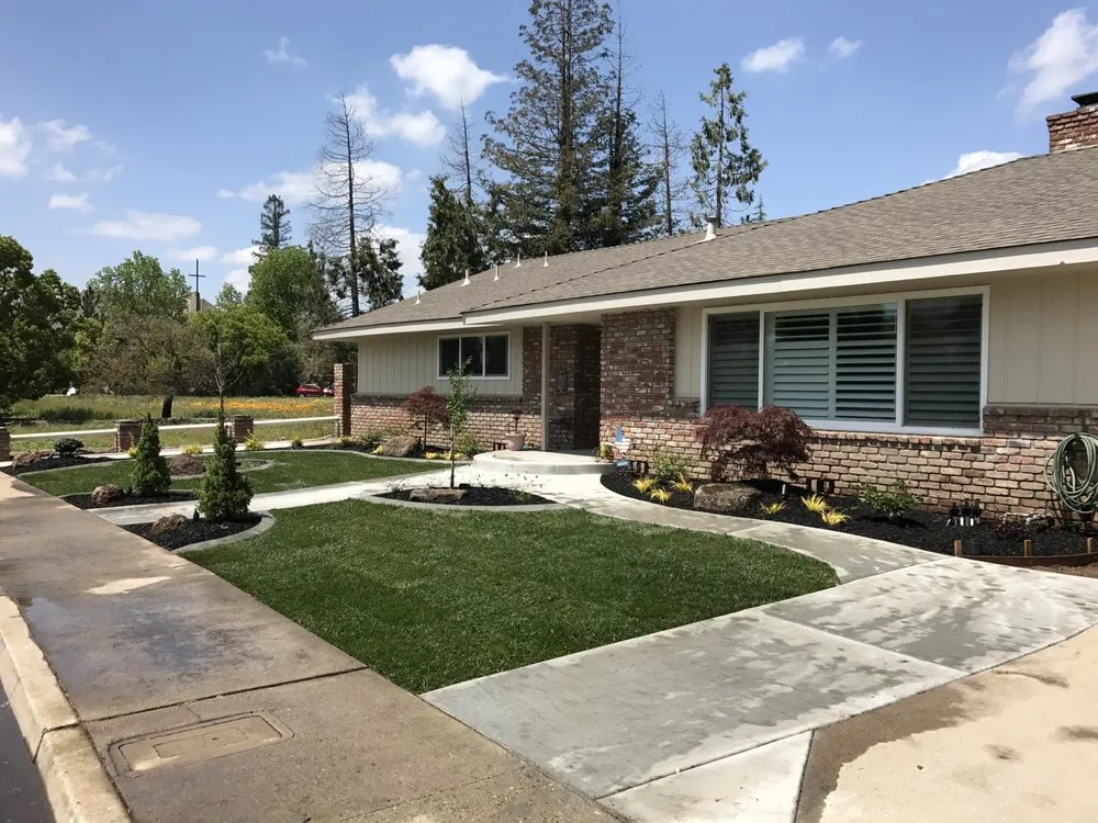 Affordable lawn mowing service with custom design in Turlock, CA by New Line & Curb