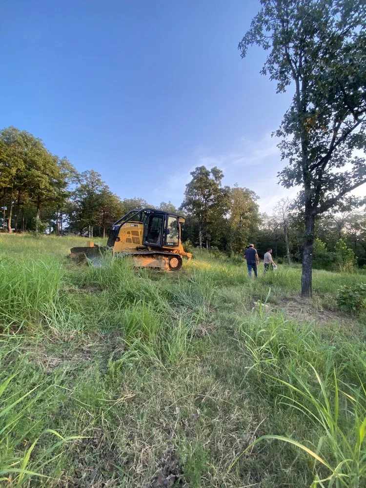 Professional lawn mowing service for beautiful yards in Poteau, OK by New Oak Construction