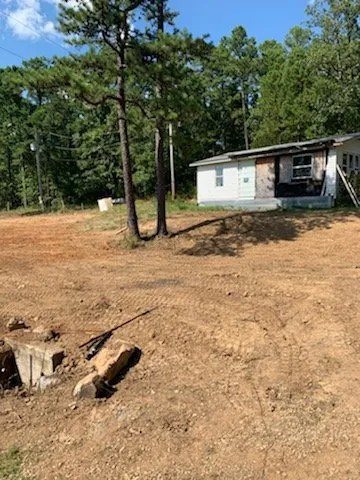 Professional landscape design for homes in Poteau, OK by New Oak Construction