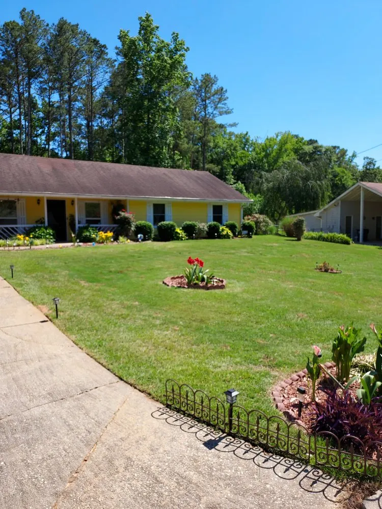 Professional lawn mowing service in Conyers, GA by New Summer Landscapes