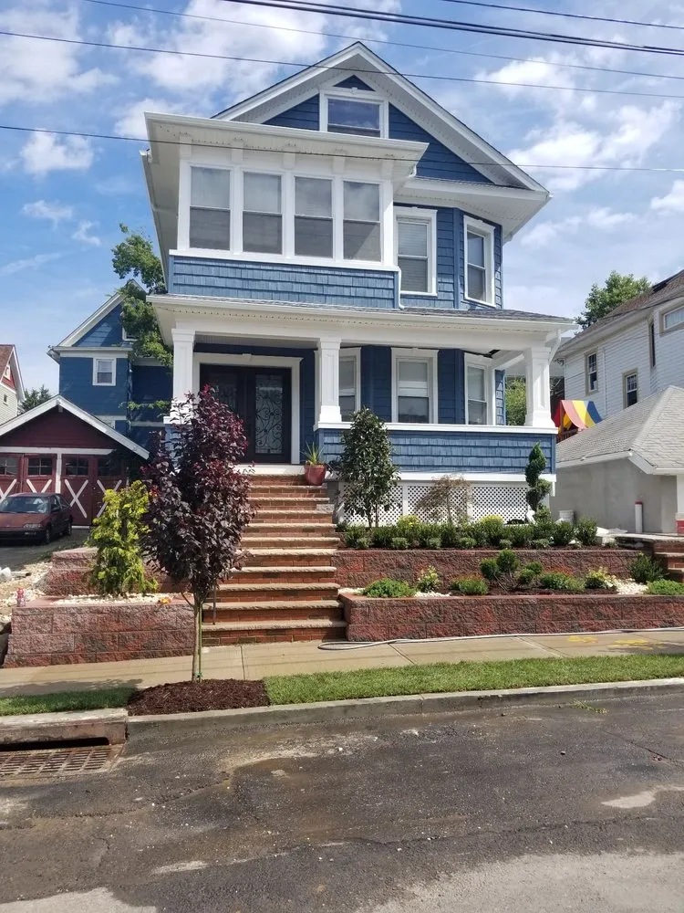 Professional lawn mowing service experts serving Staten Island, NY - New Twins Landscaping and Construction