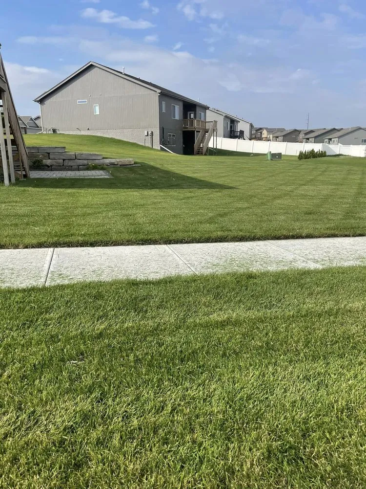 Affordable landscape design in Springfield, NE by Newco Lawn And Landscape