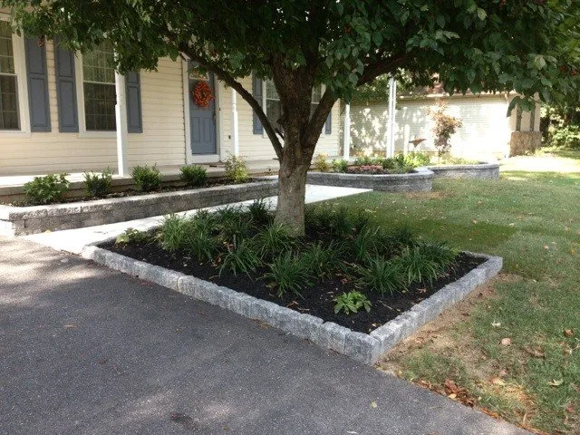 Custom garden landscaping in Danielsville, PA by NewFrontier Landscaping LLC.