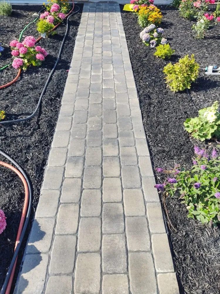 Affordable lawn mowing service for outdoor upgrades in Westmoreland, NY by Newman Landscaping and Excavating