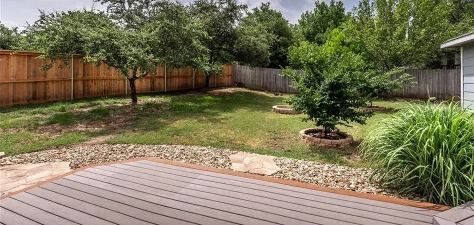 Professional yard cleanup service with custom design across Round Rock, TX - Newscape Outdoor Solutions