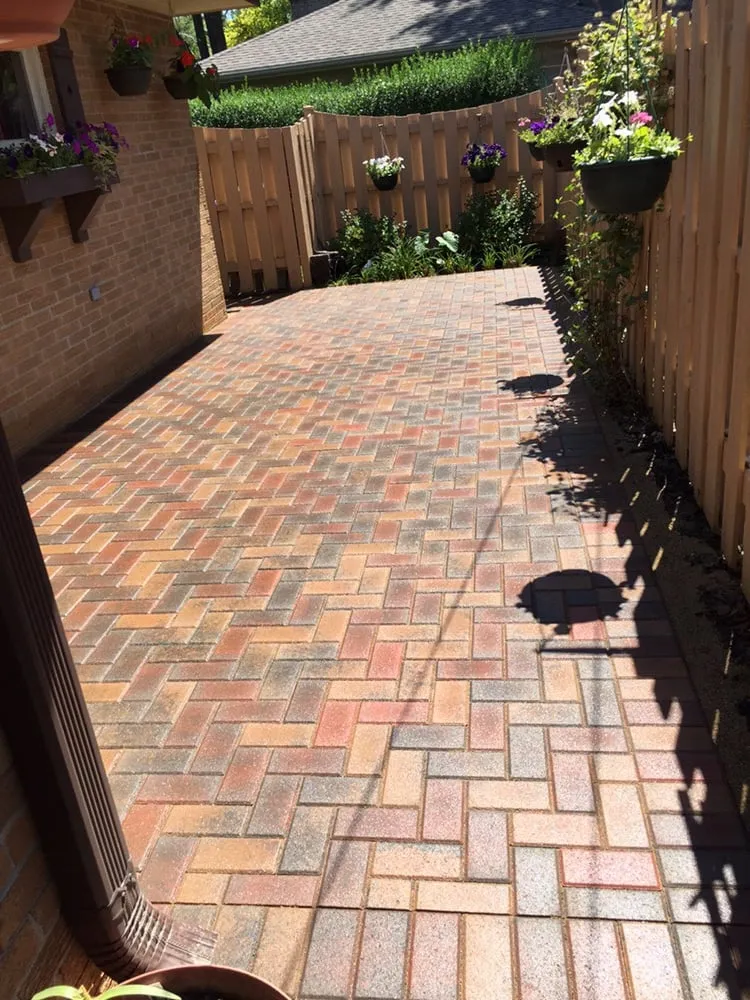 Professional yard cleanup service for year-round maintenance in Streamwood, IL by Newstar Brick Paving & Concrete