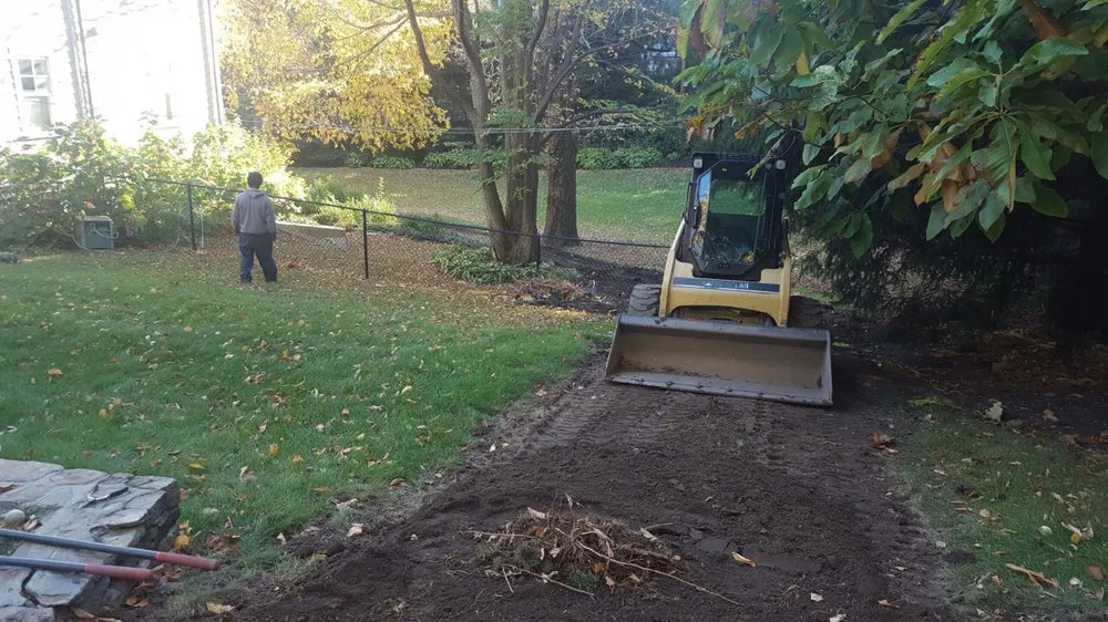 Expert yard cleanup service for beautiful yards in Newton, MA by Newton Landscape